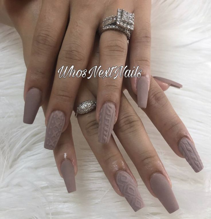 Sophisticated Elegant Nude Nail Design with Geometric Patterns and Textured Finishes.