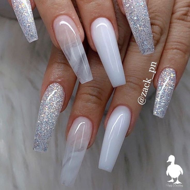 Stunning Elegant Long Acrylic Nails with Glitter, Glossy White, and Marble Effect.