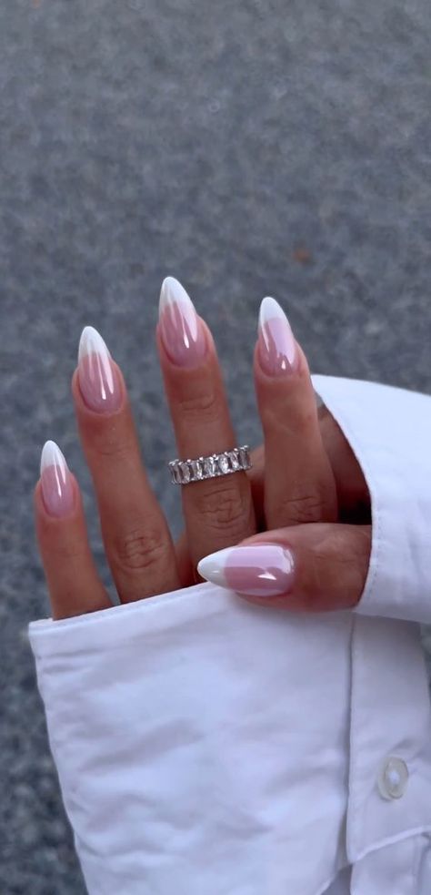 Chic Almond-Shaped French Tip Nails: A Timeless Blend of Soft Pink and White Elegance.