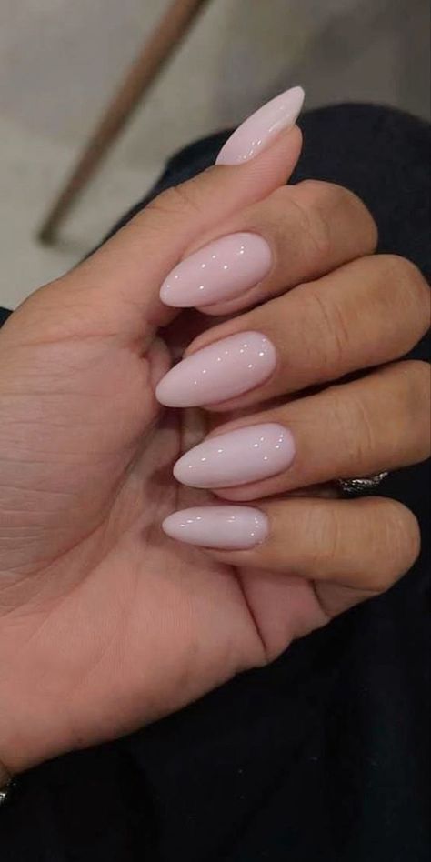 Chic Almond-Shaped Nails: Elevate Your Look with Glossy Nude Polish