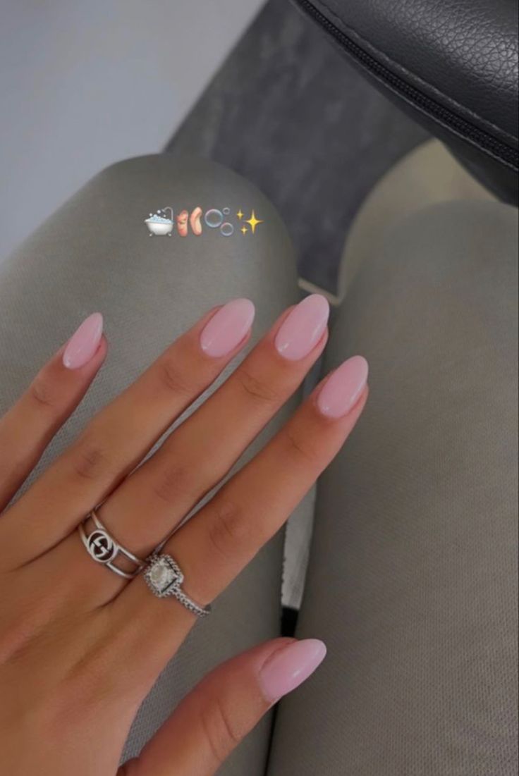 Sophisticated Light Pink Oval Nails: Chic Elegance for Any Occasion.