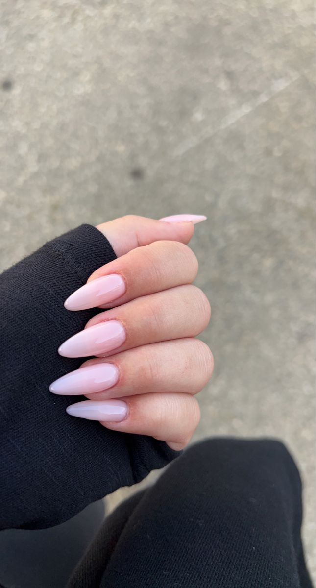 Chic Soft Pink Matte Almond-Shaped Nails: Versatile Elegance for Any Occasion.