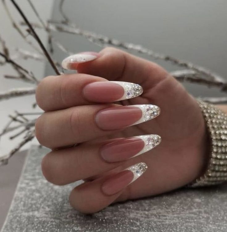 Chic Nude and White Nail Design with Glitter Accents for Any Occasion