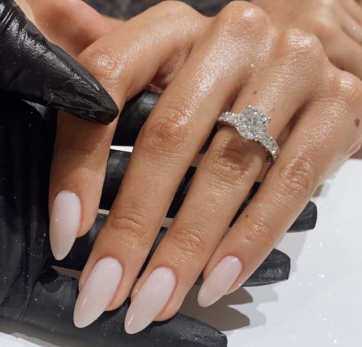 Sophisticated Almond-Shaped Nude Nails Enhance Natural Beauty and Elegance.