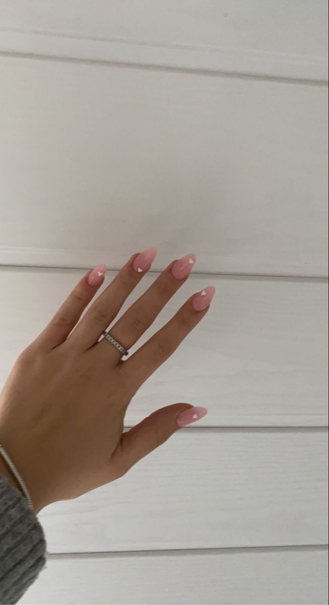 Sophisticated Almond-Shaped Nails with Soft Pink Base and White Tip Accent.