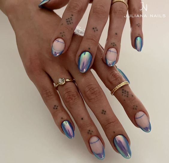 Stunning Iridescent Almond Nail Design with Gradient Hues and Dotted Accents.