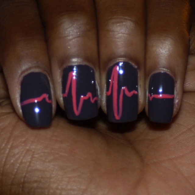 Bold Nail Art: Dark Base with Vibrant Pink Heartbeat Lines for Personality Expression.