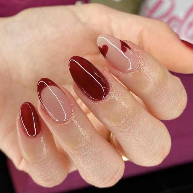 Sophisticated Nail Design: Deep Burgundy and Nude with Charming Heart Motif