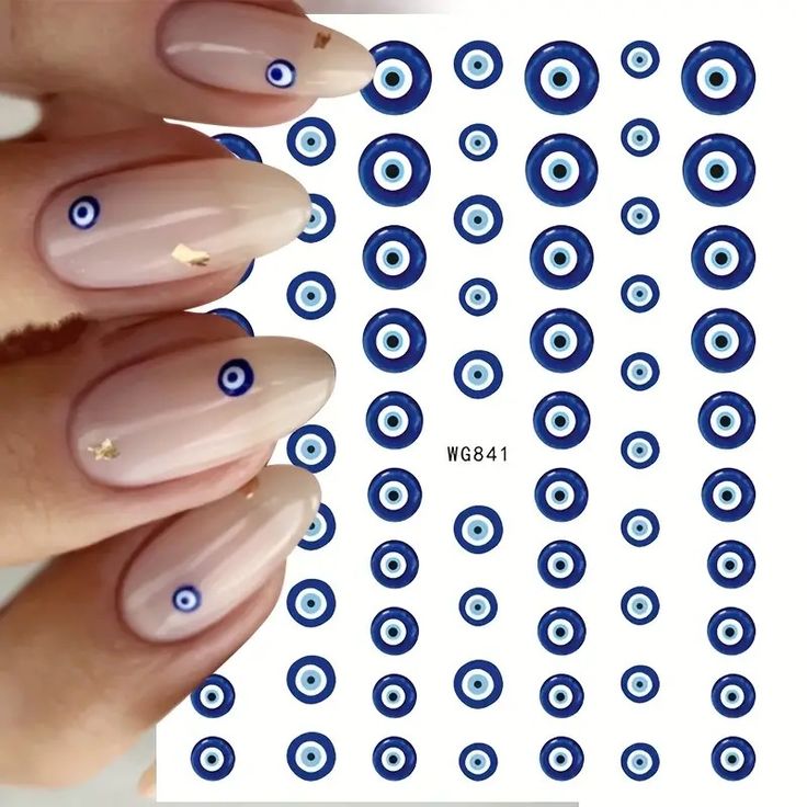 Trendy Nude Nail Design with Vibrant Eye Motifs and Elegant Gold Accents