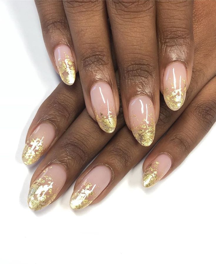 Elegant Nude and Gold Nail Design for Glamorous Occasions.