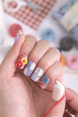 Whimsical Nail Art: Playful Patterns and Vibrant Colors with Unique Accents.