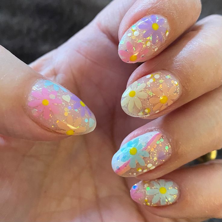 Pastel Floral Nail Design with Daisies and Glitter Accents