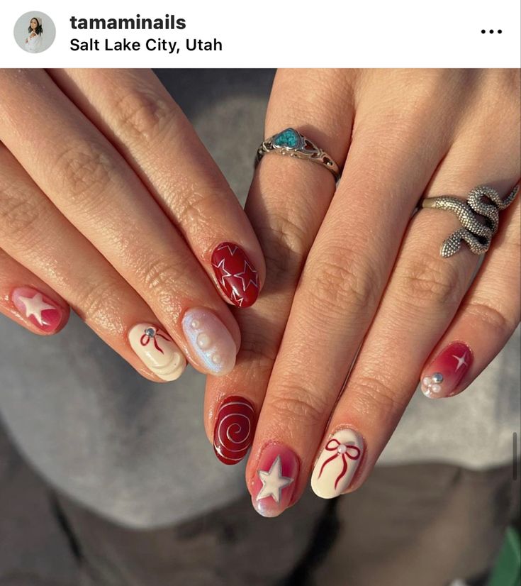 Festive Chic Nail Art: Vibrant Red and White Designs with Stars, Ribbons, and Polka Dots