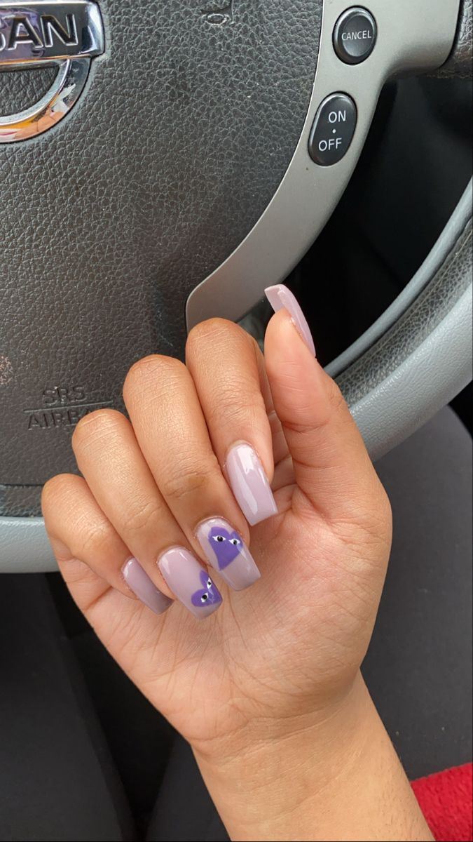 Charming Lavender and Deep Purple Nail Design with Glossy Finish and Whimsical Accents.