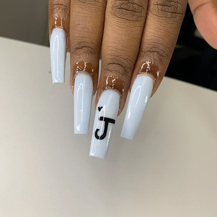 Sleek White Long Nails with Minimalist Black Graphic for Modern Elegance.