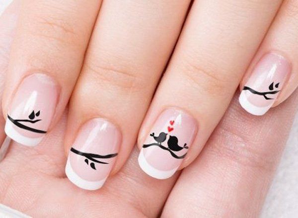 Elegant French Tip Nail Design with Artistic Branch Motifs and Romantic Bird Illustrations.