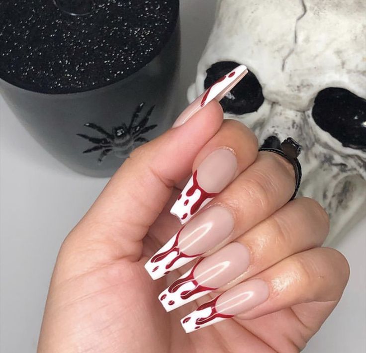 Edgy Halloween Nail Design: Nude and White with Bold Red Drip Accents