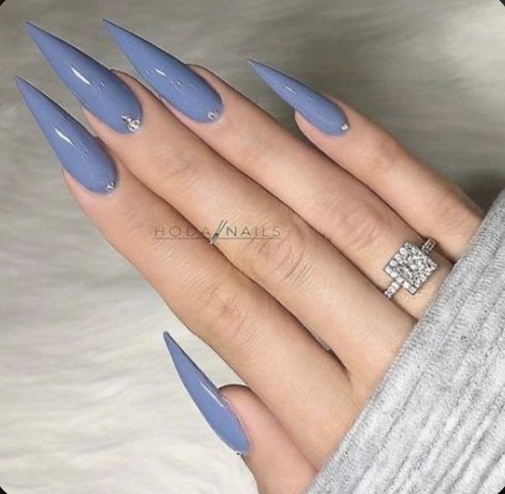 Chic Lavender Stiletto Nails with Delicate Sparkle Accents.