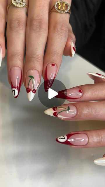 Whimsical Cherry-Themed Nail Design with Heart Motifs and Gradient Accents