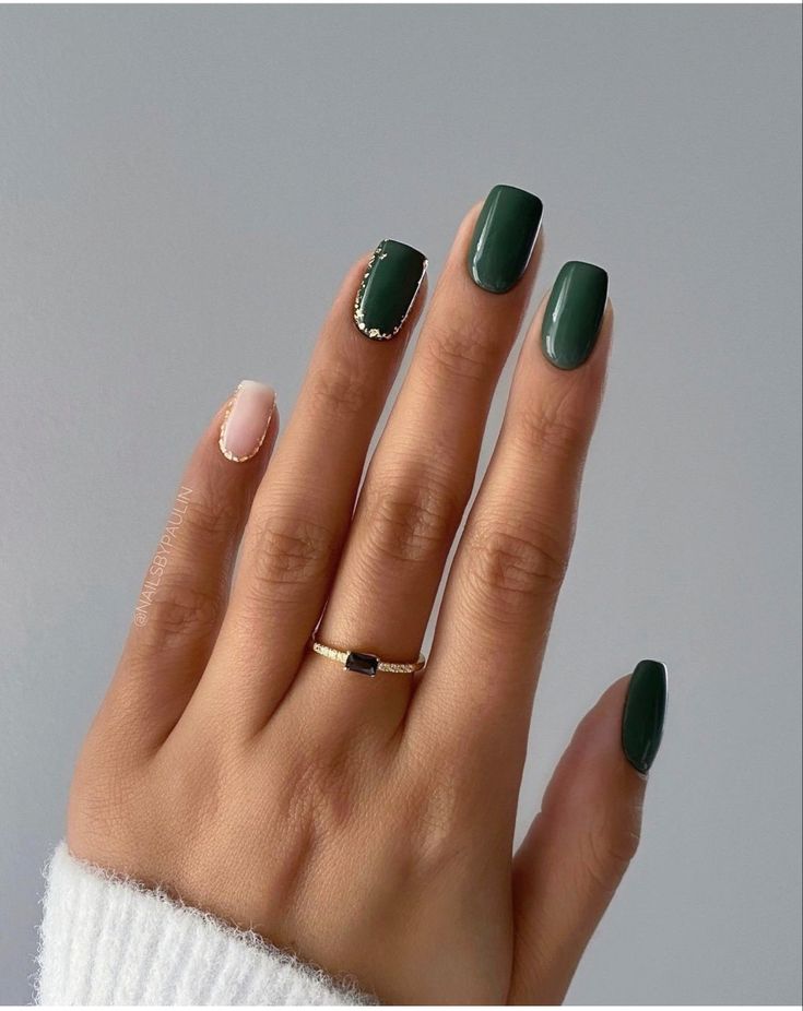 Sophisticated Deep Green and Blush Nail Design with Beaded Accent.