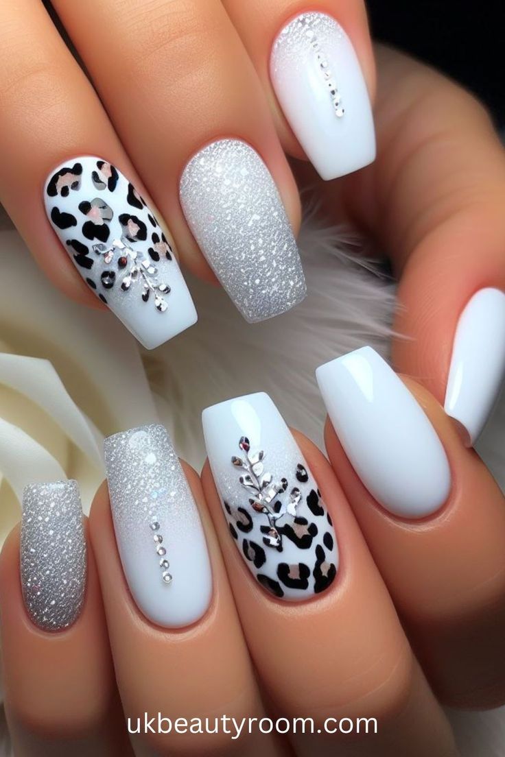 Chic Nail Design: Textured Elegance with White, Silver, and Bold Leopard Print.