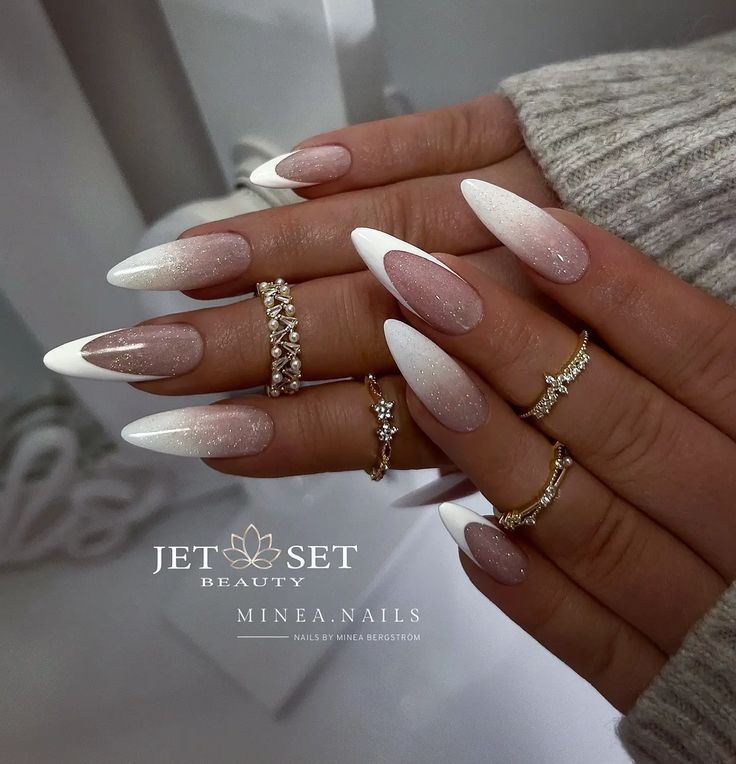 Chic Ombre Almond Nails with Sparkle and Rings: A Perfect Blend of Sophistication and Trendiness