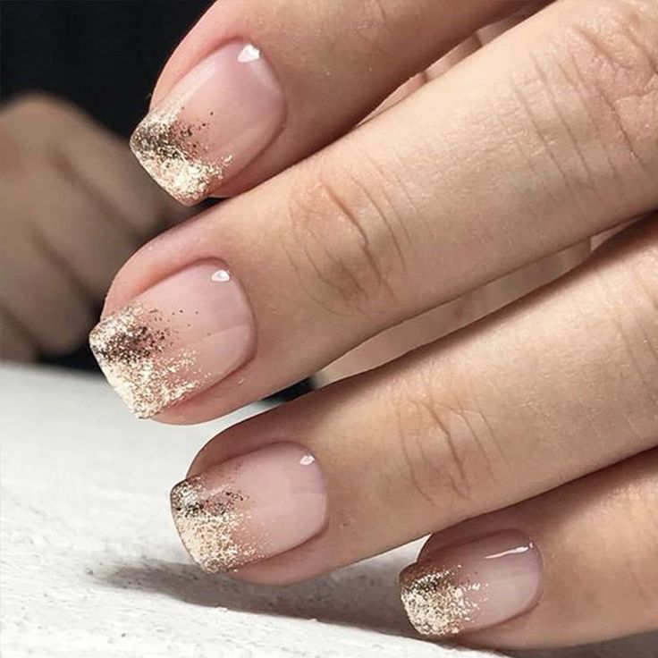 Sophisticated Glitter Gradient on Elegant Nude Nails: A Luxurious and Versatile Design.