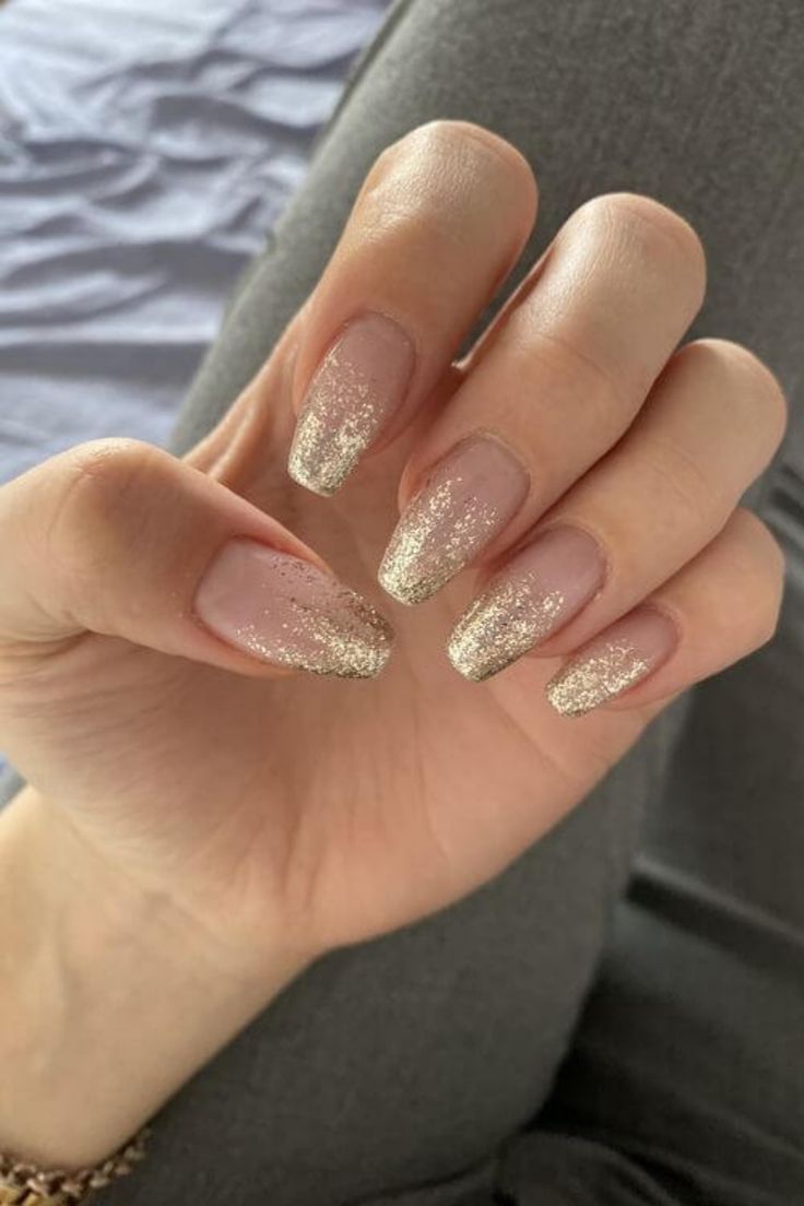 Chic Glitter Gradient Nail Design: Elegant Nude Base with Sparkling Gold Tips