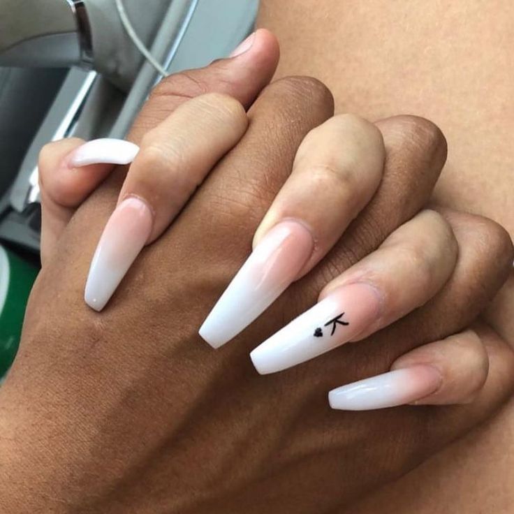 Chic Ombre Nail Design with Pointed Tips and Minimalist Accents