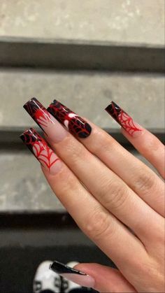 Elegant Spider-Themed Nail Design with Striking Black and Red Color Scheme for a Spooky Aesthetic.