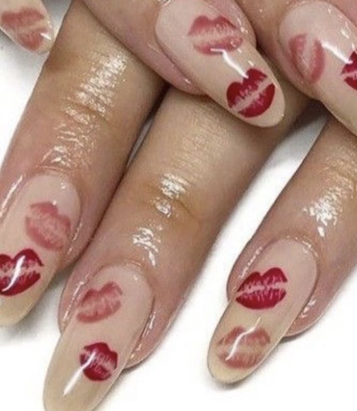 Flirty Lip Print Nail Art: Whimsical Red and Pink Design on Soft Nude Base