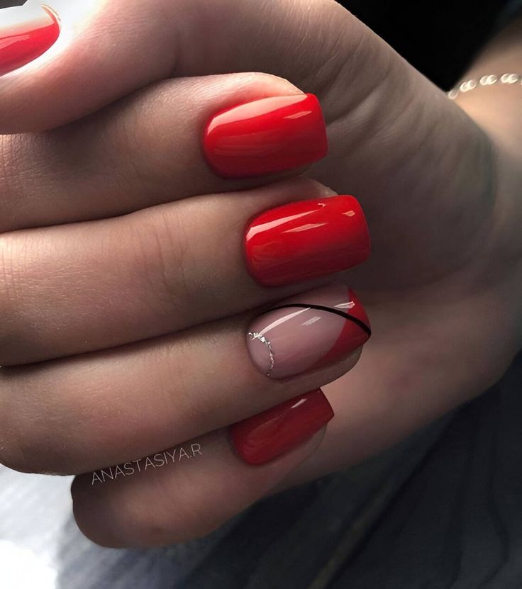 Bold Red and Chic Nude Nail Design with Elegant Accents