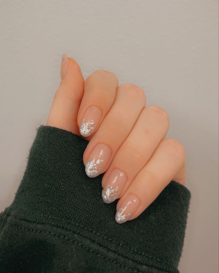 Sophisticated Beige Nail Design with Glitter Tips for All Occasions.