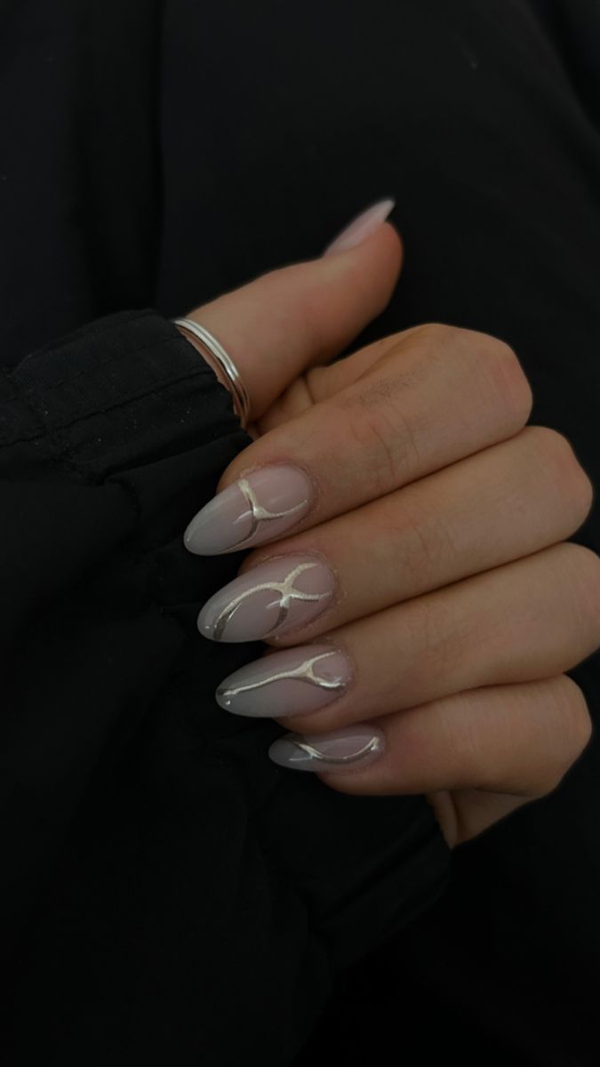 Sophisticated Nail Design: Pale Pink Gradient with Golden Marble Accents