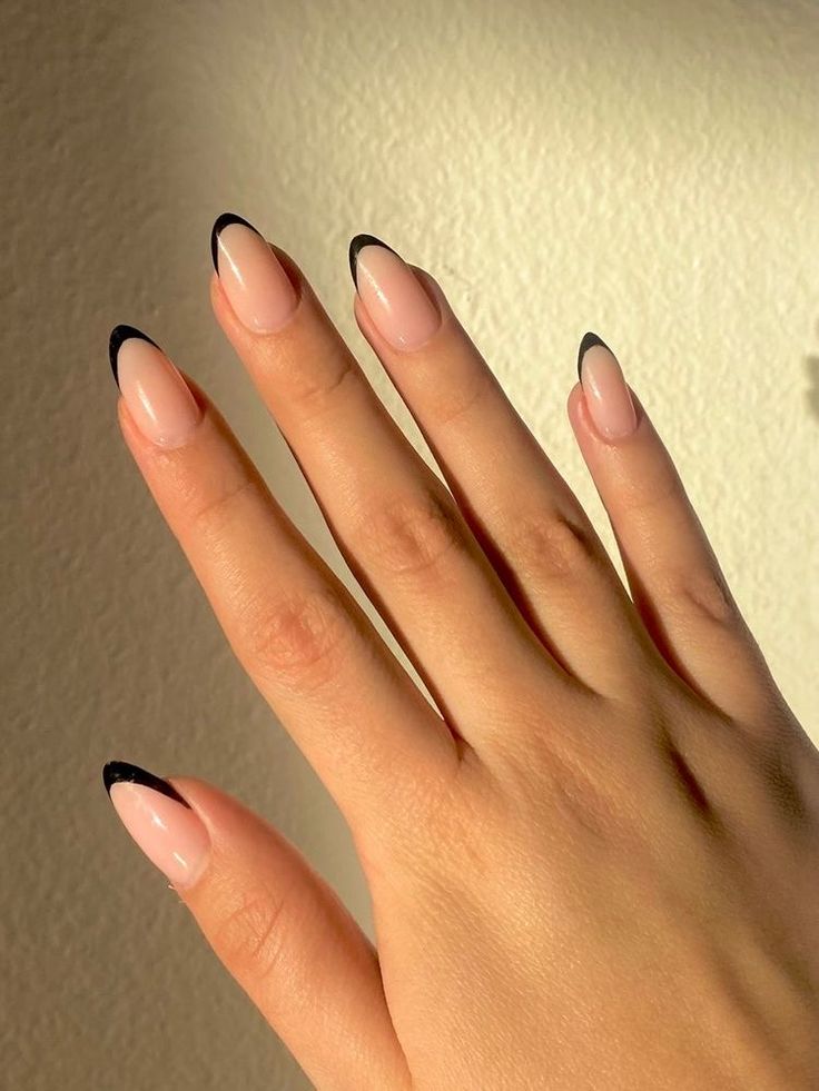 Chic Modern French Manicure: Delicate Nude Base with Bold Black Tips