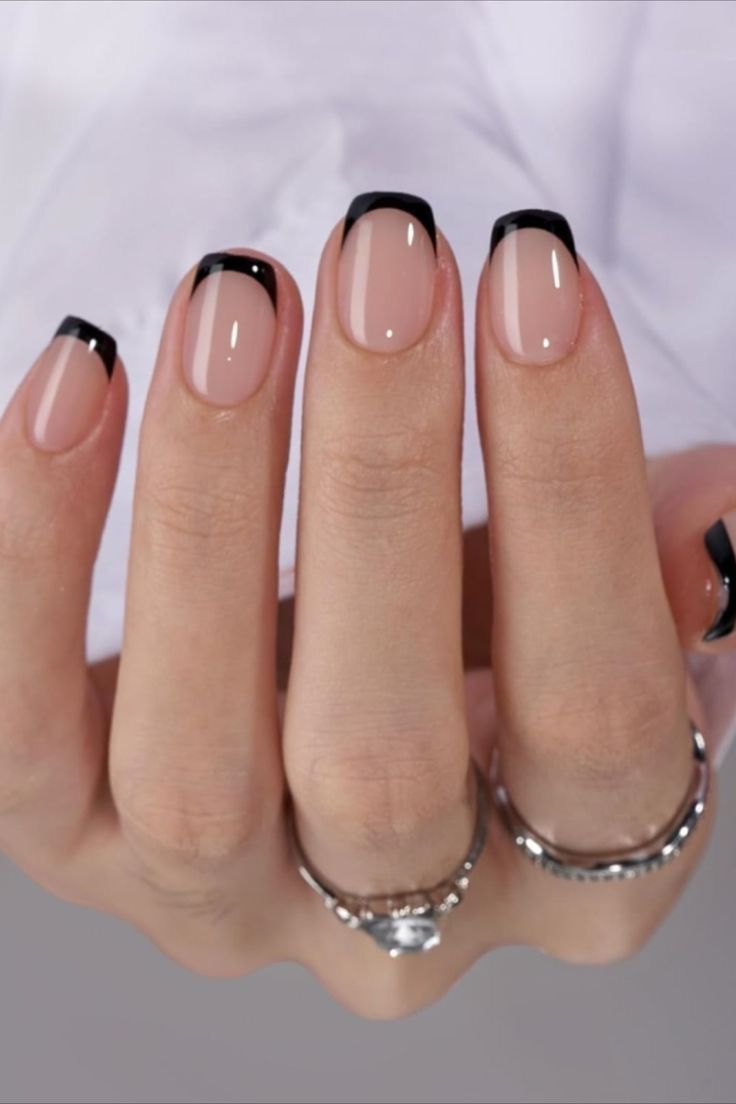 Chic Nude and Black French Manicure: A Sophisticated Twist for Any Occasion.