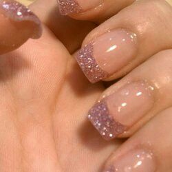 Chic Sparkling Pink Glitter Nail Design: A Perfect Blend of Subtlety and Glam.