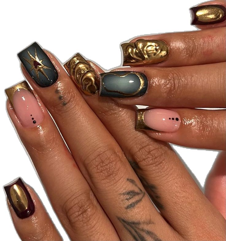 Bold Nail Design: Deep Colors with Metallic Accents and Modern Patterns