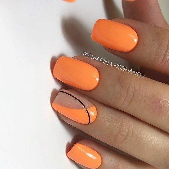 Bold Orange Nail Design with Sleek Black Accents for a Modern Look.