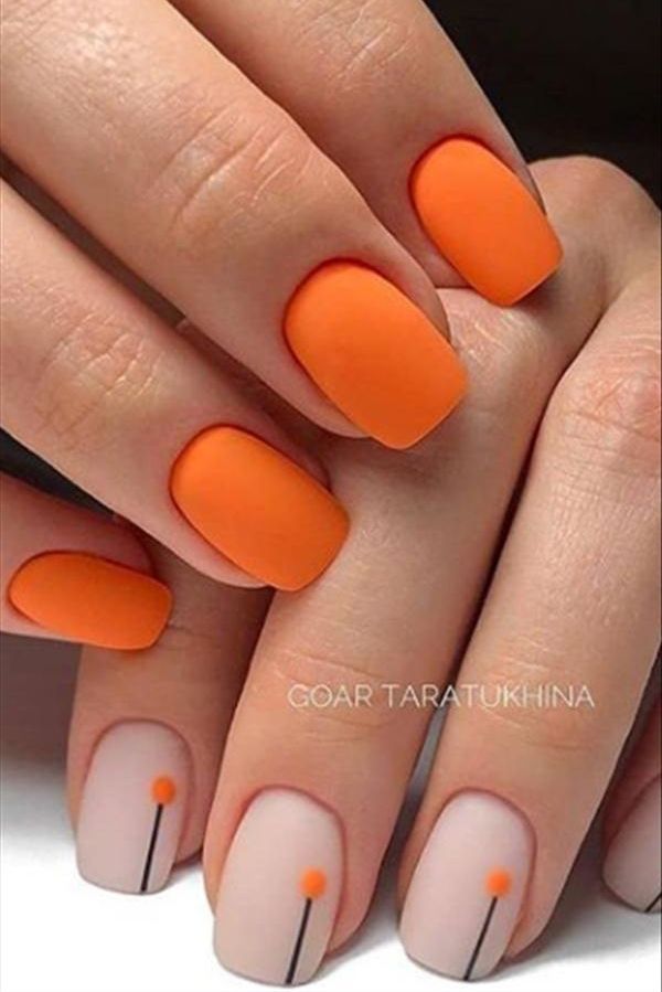 Chic Nail Design: Bold Orange Matte with Elegant Nude Accents