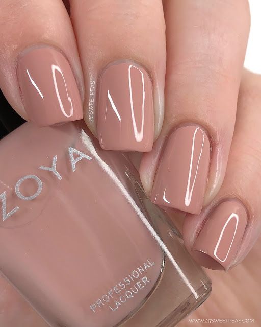 Sophisticated Glossy Nude Manicure for a Chic, Natural Look.