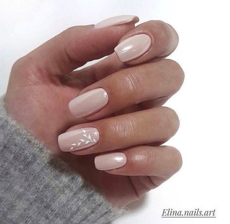 Sophisticated Glossy Nude Nails with Delicate White Leaf Accents.