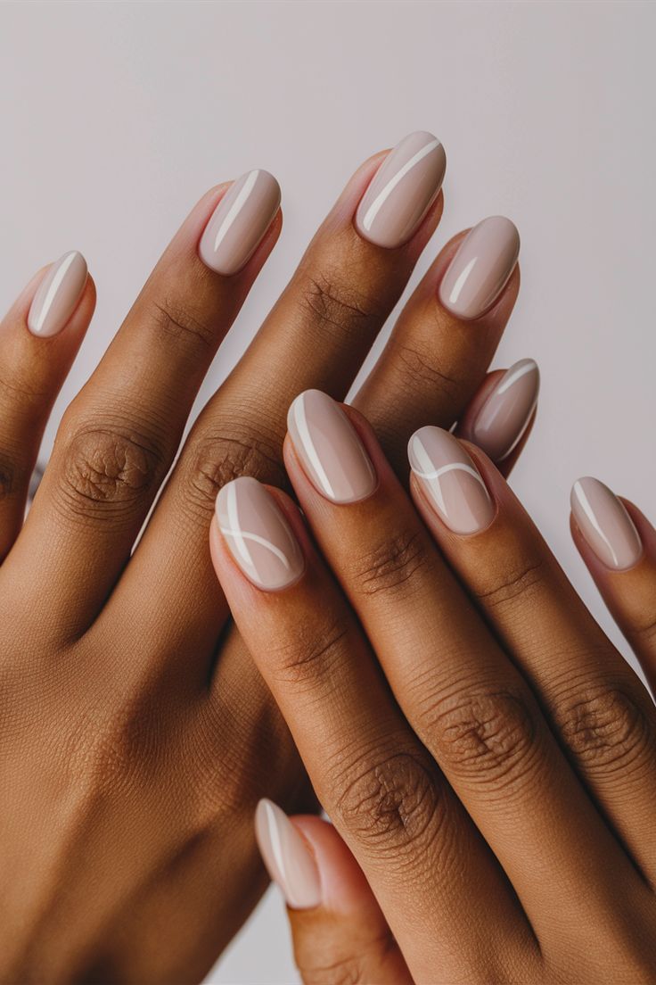 Chic Elegant Nail Design: Soft Nude Base with White Accents for Versatile Sophistication