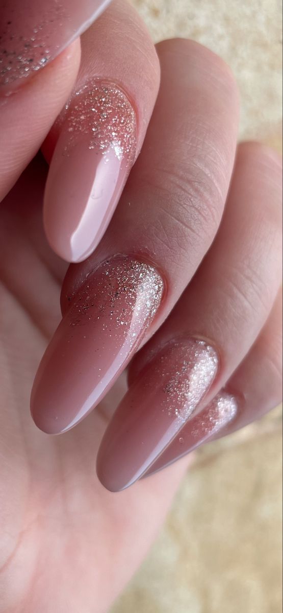 Chic Soft Pink Gradient Nail Design with Glitter Accents for Sophisticated Occasions