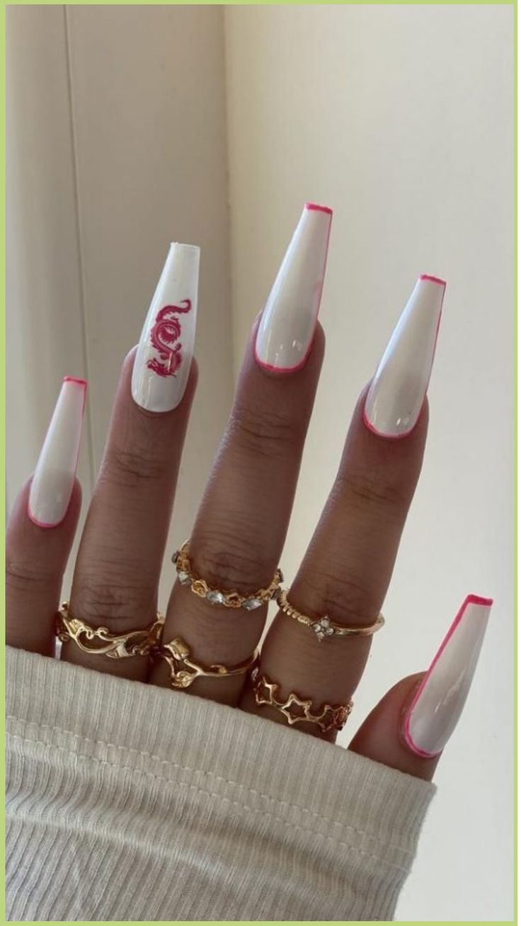 Chic White and Pink Tipped Long Nails with Personalized Accent and Trendy Gold Rings.