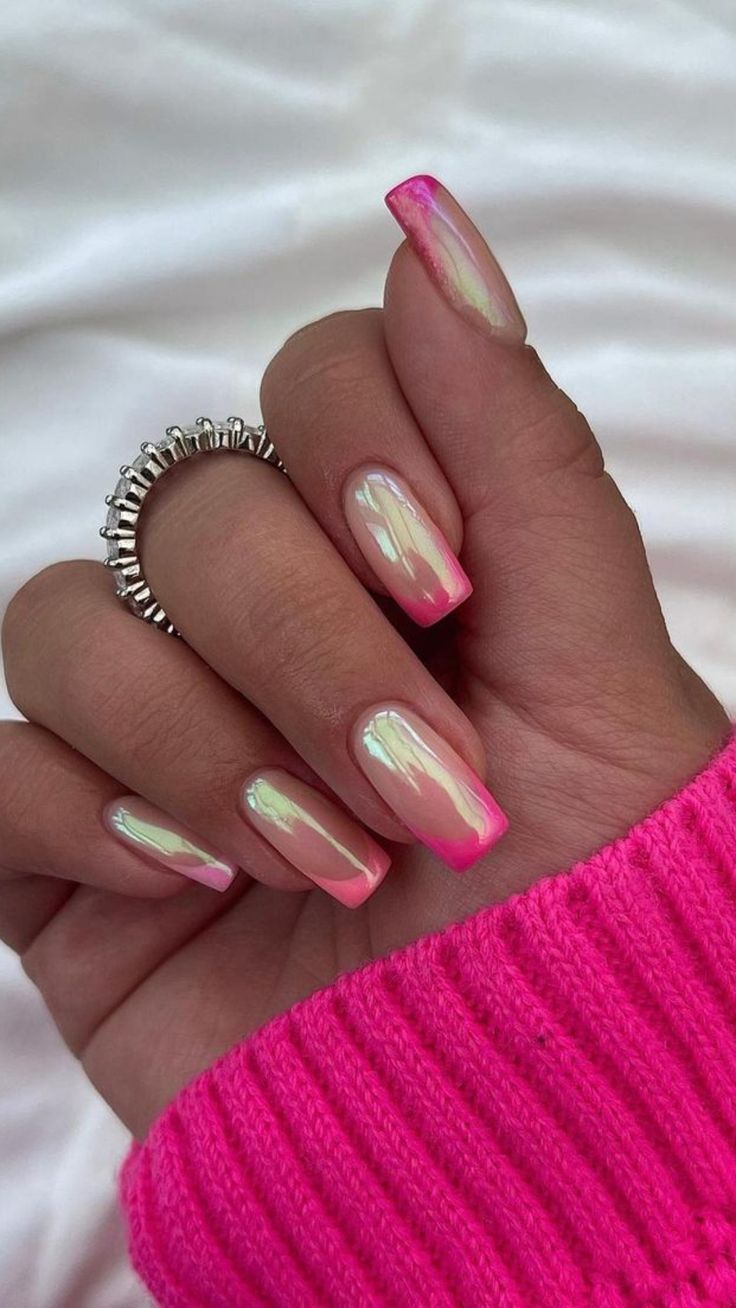 Chic Glossy Nail Design with Iridescent Pink Gradient for a Vibrant Look.