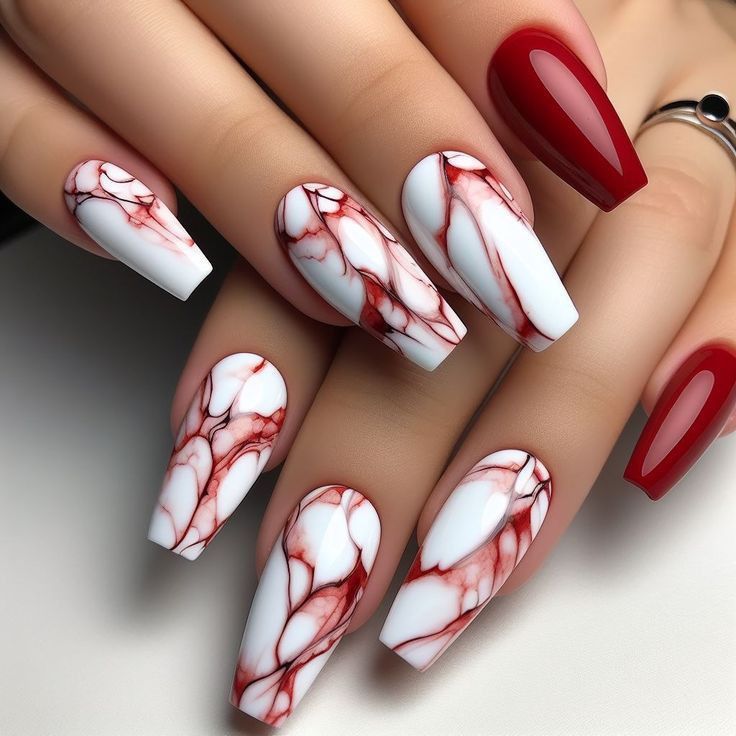 Chic Elegant Nail Design: White and Deep Red Marble with Glossy Accent.