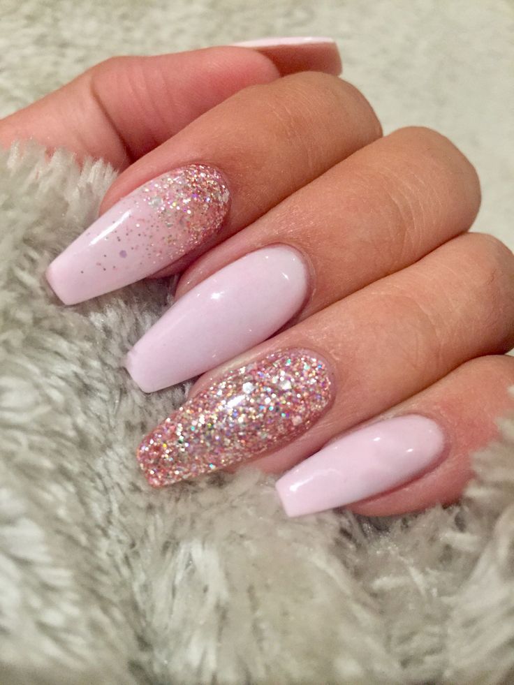 Sophisticated Soft Pink Nails with Sparkling Glamour Accents.