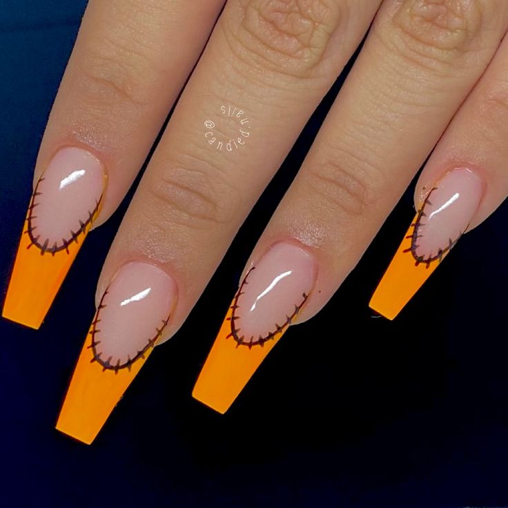 Vibrant Orange Square Tip Nail Design with Stitched Detail for Festive Flair.