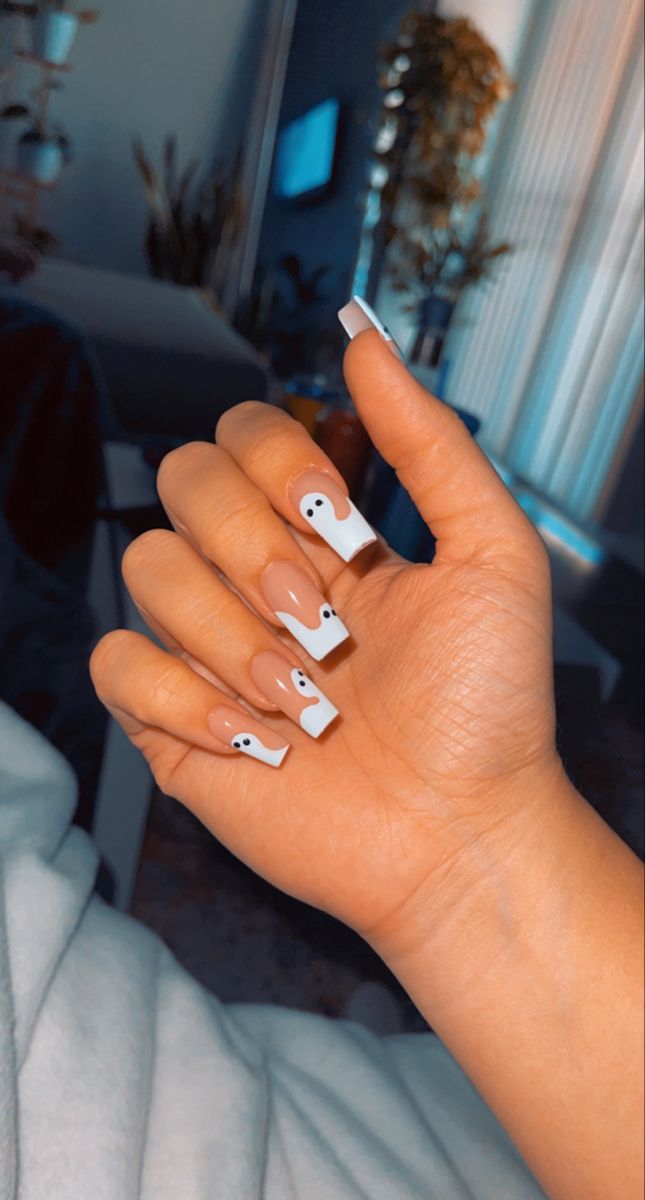 Playful Ghost-Themed Chic Nail Design with White Tips and Black Accents